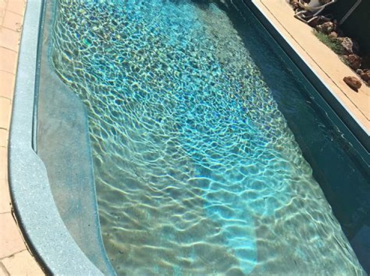 How do you remove stubborn pool stains?