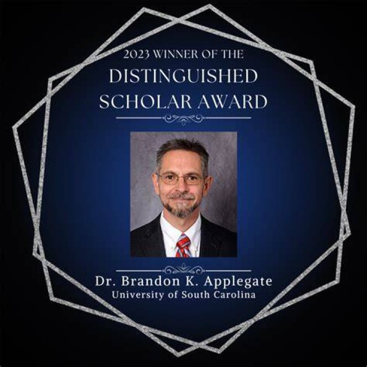 What is a distinguished scholar?