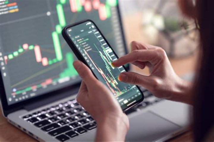 Which benefits do investors enjoy because of the existence of organised security exchange?