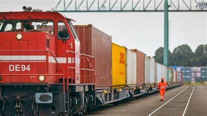 Why was it cheaper to transport goods by rail rather than roads?